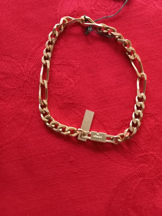 Pulseira dourada,  malha batida, marca Shock