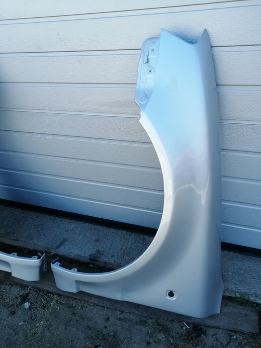 Błotniki Skoda Superb 1 srebrny kod lakieru 9102