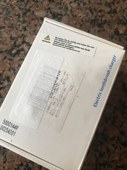 Зарадний для зубних електрощіток .