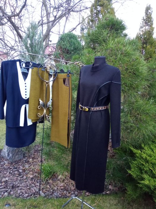 новый элегантный Польский костюм52-54р.