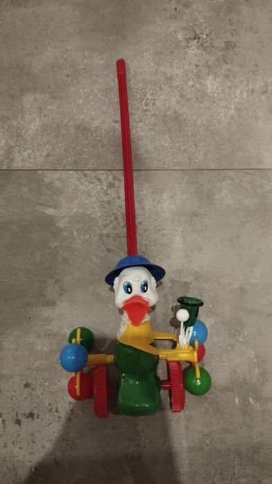 Pchacz kaczor z dzwonkiem dla dziecka jak nowy