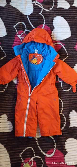Зимові комбінезони