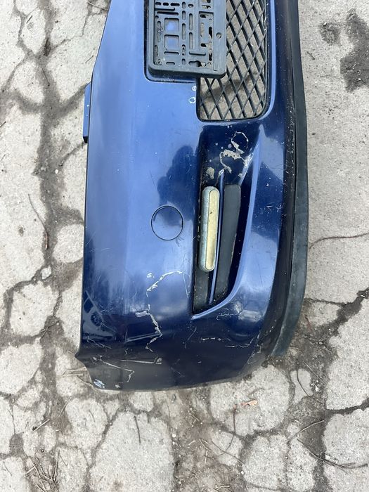 Передній бампер Mazda 2  Мазда 2 2003-2007