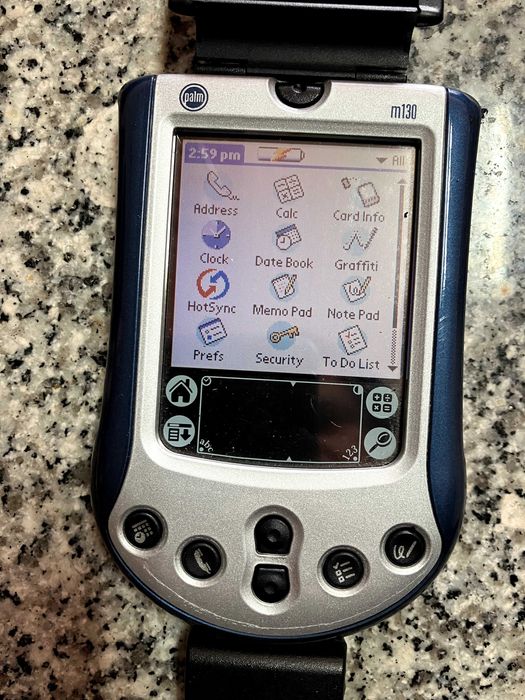 Palm M130 com carregador, caixa , dock e software,  precisa de bateria