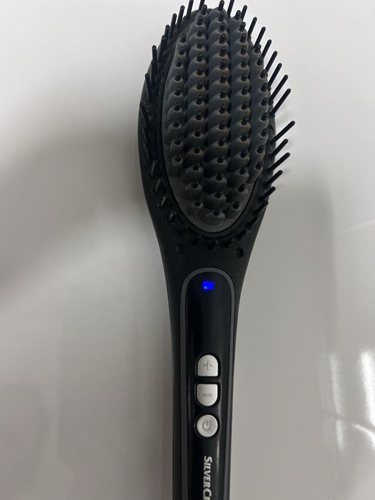 Escova de cabelo eletrica