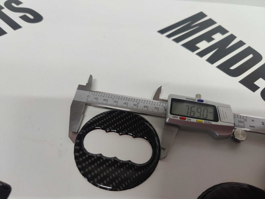 Símbolos do volante tipo carbono