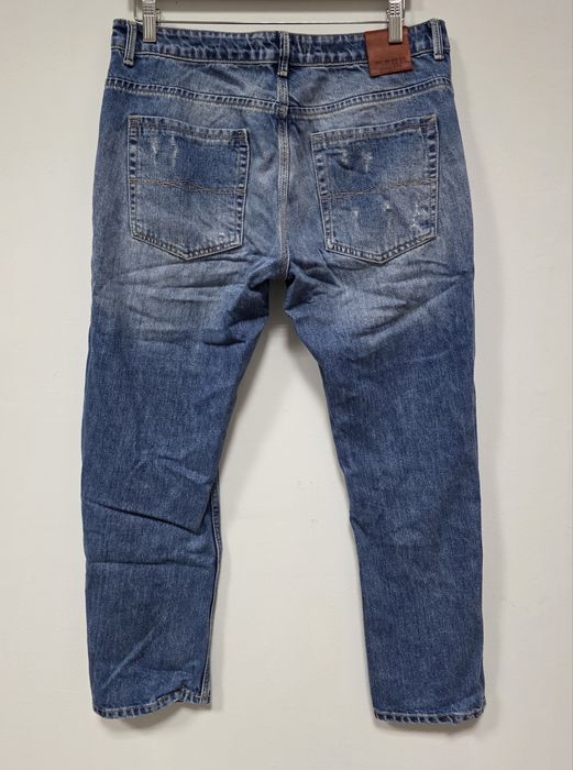 Zara damskie jeansy z dziurami 42 XL zwężane