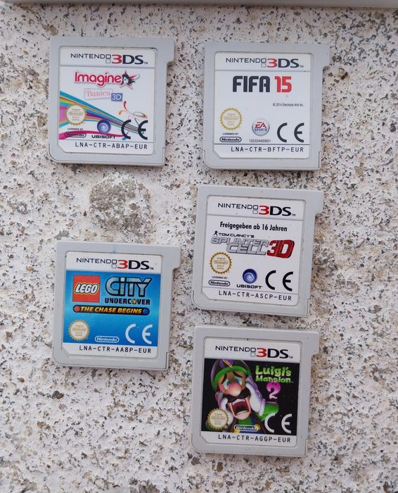 Nintendo 2 DS + 15 jogos, carregador e capa.