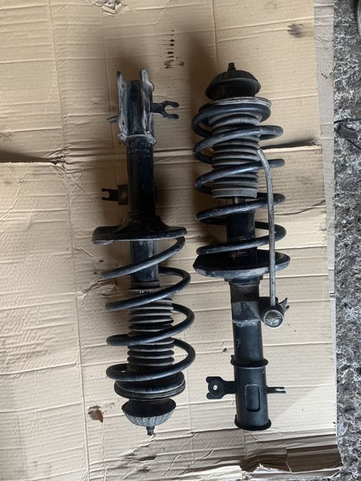 Передние стойки амортизаторы Шевроле Авео заз вида опоры пружины СТО