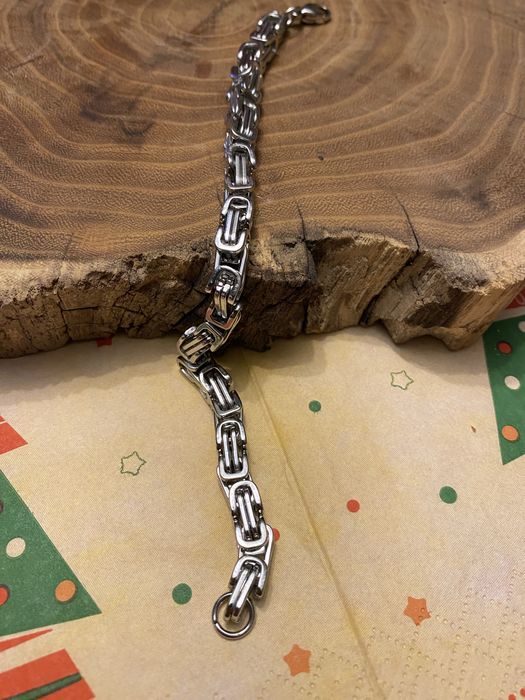 Nowa gruba bransoletka ze stali nierdzewnej. wzór splot królewski