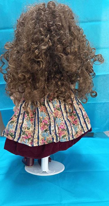 Boneca em porcelana445523186995046403