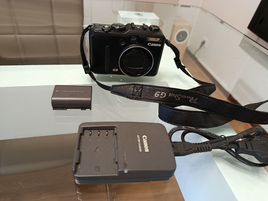 Canon G9 completa, carregador e 2 baterias, precisa limpar obturador ou para peças.