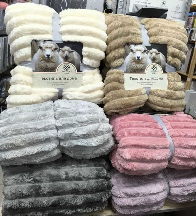 Теплі пледи на штучний овчині
