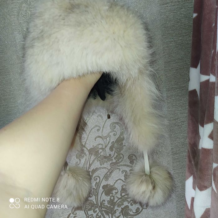 Шкіряна шапка з писцем