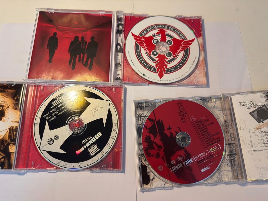 Discman + 3 cd.