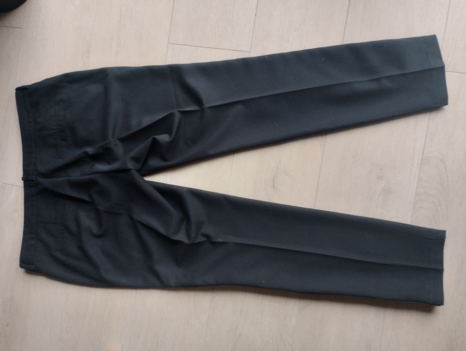 Mohito eleganckie czarne spodnie ze srebrnymi lampasami r. 42 L