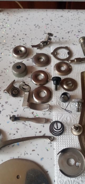 Запчасти швейной машинки.
