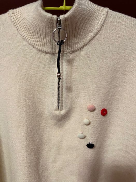 Продам стильний жіночий светр в молочному кольорі