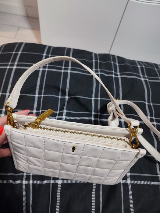 Kremowo złota torebka na pasku Ochnik