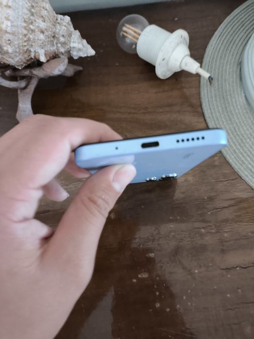 Redimi 12 azul  saí carregado com capa