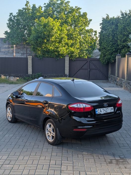 Ford Fiesta 2018 VIN 3FADP4BJ0JM108228 фото оголошення 4 з 20