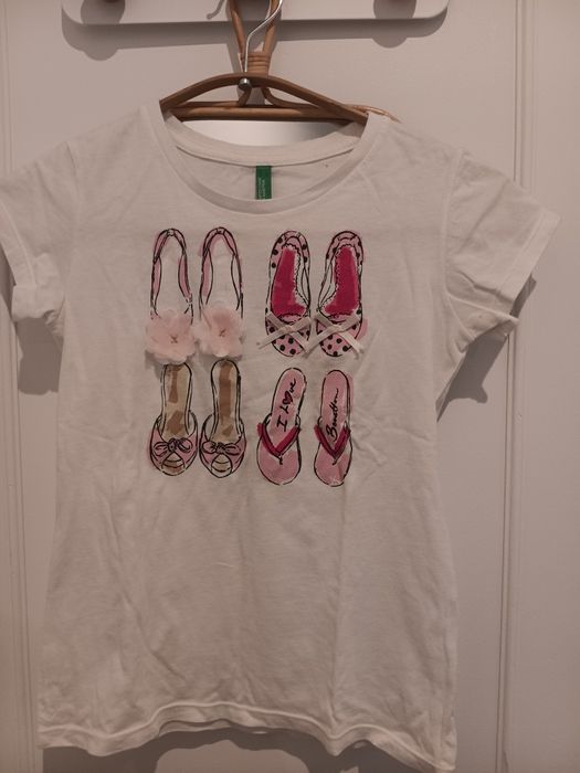 T-shirt menina 5/6 anos benetton
Em bom estado