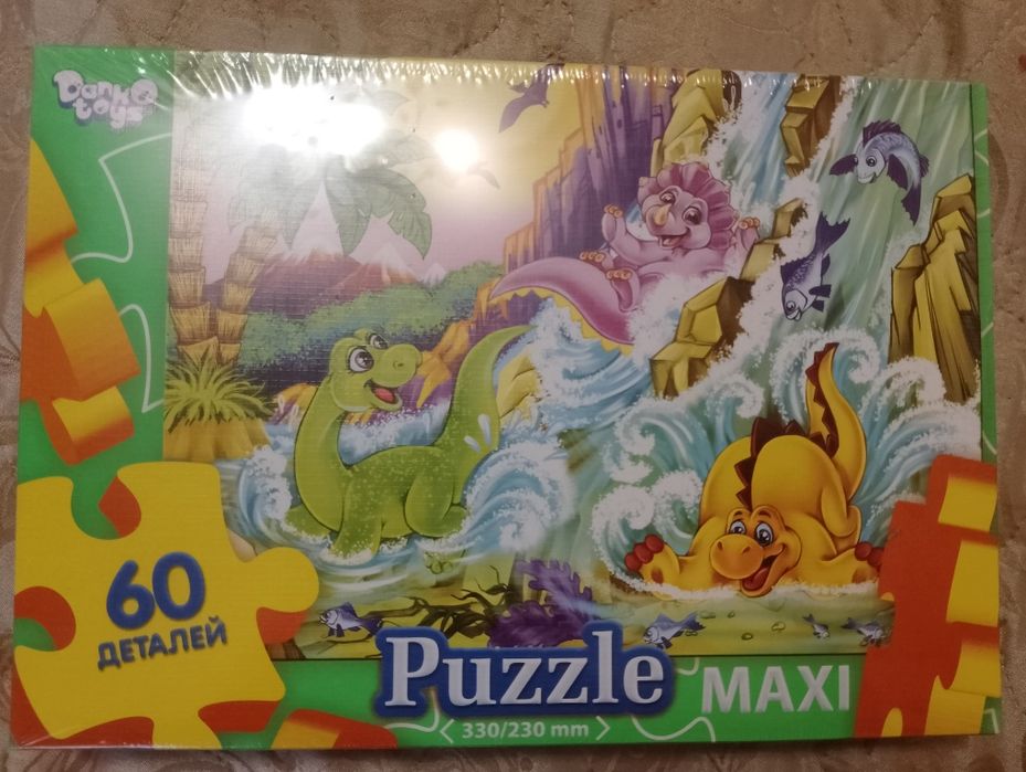 Пазли "Динозаври біля водоспаду"