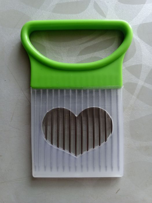 Тримач для нарізання овочів 50 грн