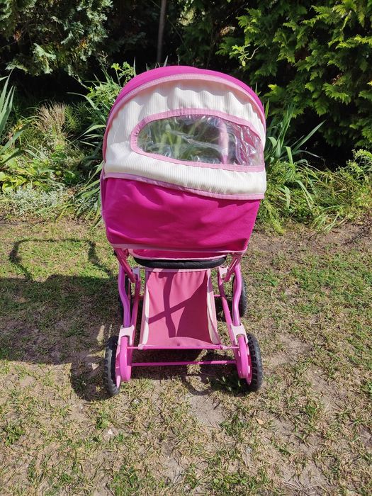 Różowy wózek dla lalek