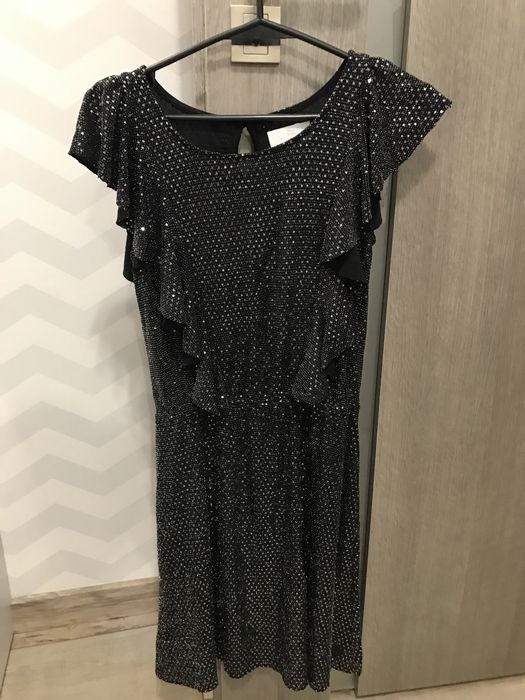 Elegancka sukienka dla dziewczynki Smyk 152