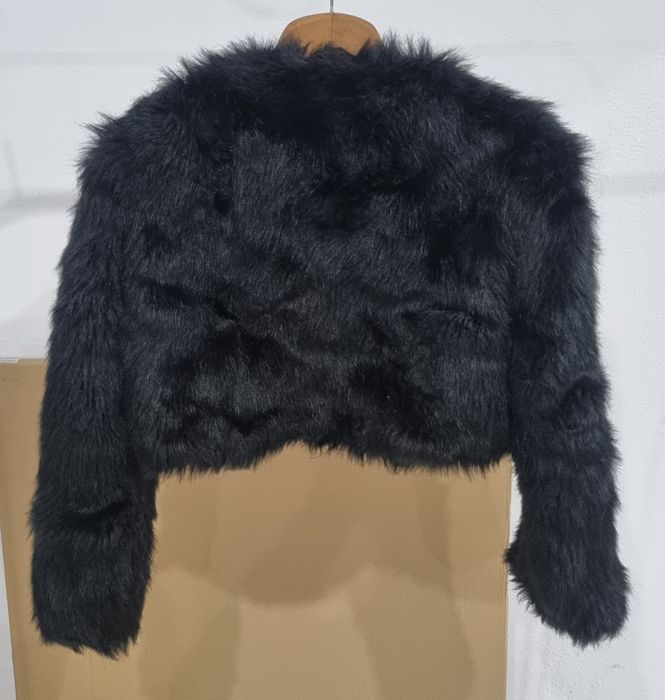 Casaco de Mulher não é novo em bom estado