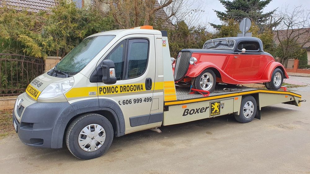 Pomoc drogowa, transport aut, laweta, holowanie, awaryjne odpalanie