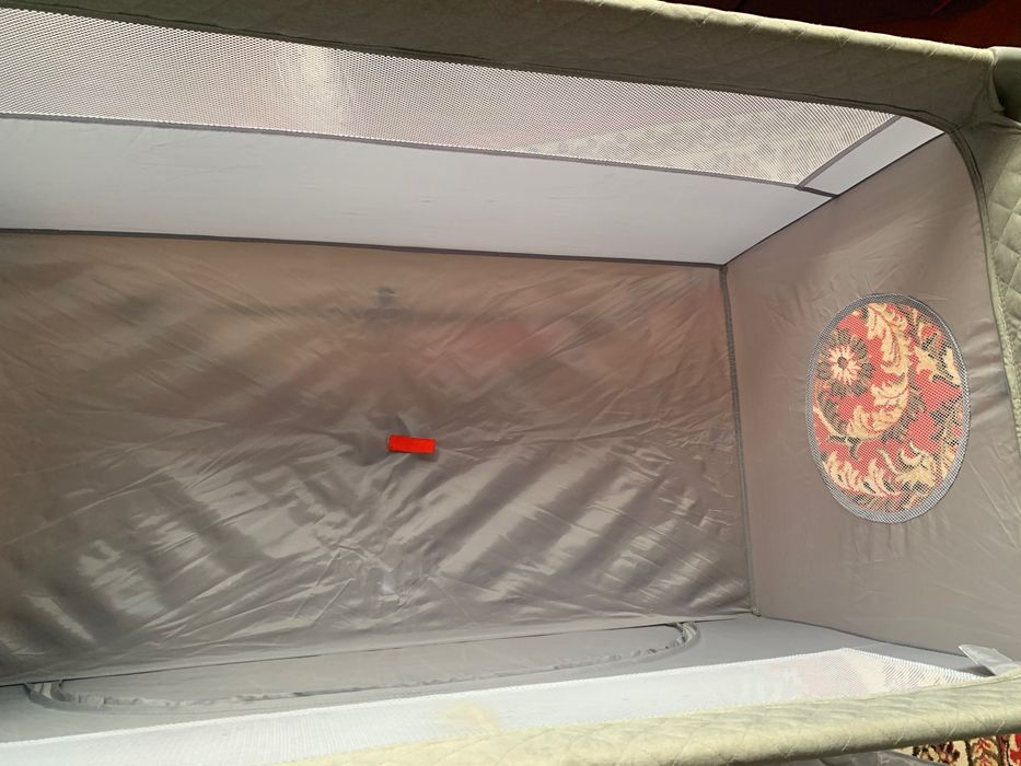 Дитяче ліжечко манеж
