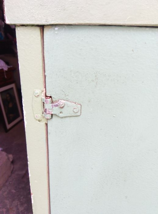 Antigo armário de farmácia em madeira