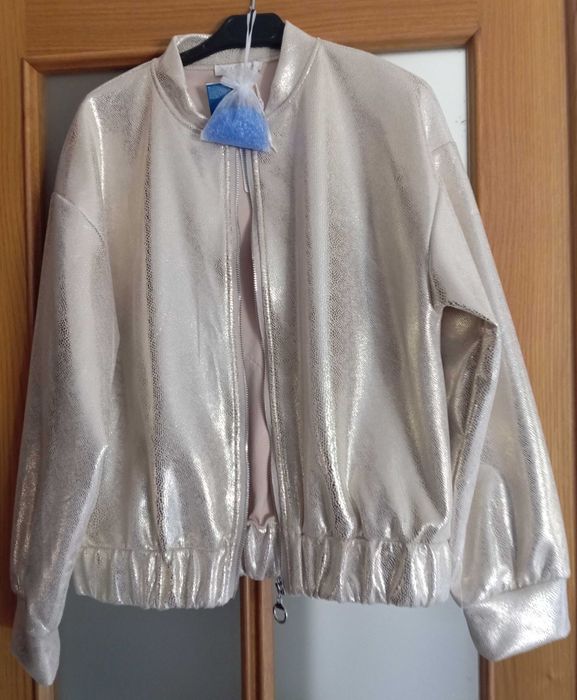 Bomber Lurex champanhe 58 cava com aplicação de estrela nas costas