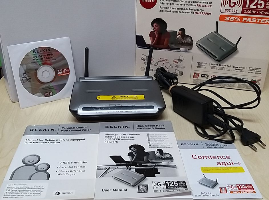 Router Belkin, com manual de instruções.