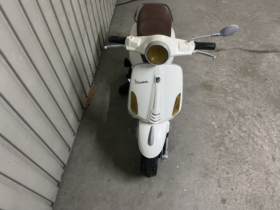 Scooter eletrica de crianca