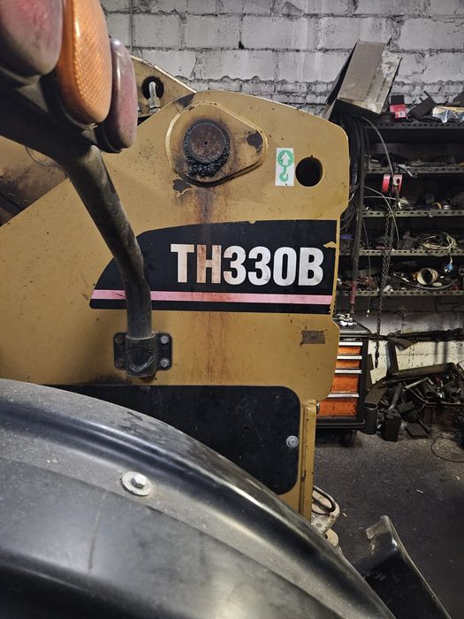 Cat th 330b most przedni, tylny