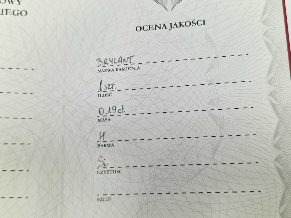 Złoty pierścionek/ 585/ 1.79 gram/ R10.5/ DIA 0.19 CT/ certyfikat