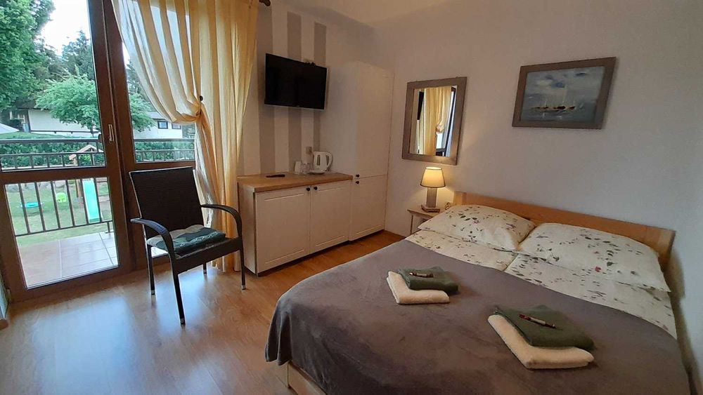 "Słoneczna Ostoja" Pokoje gościnne Apartamenty Mikołajki Mazury