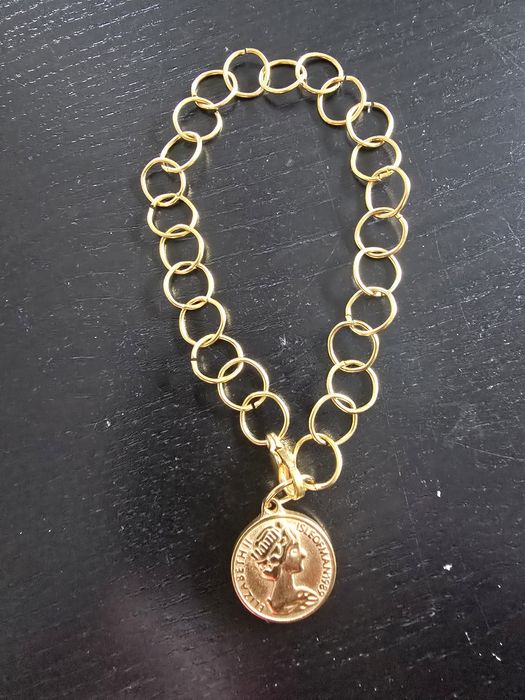 Pulseira com pendente em ouro cubano