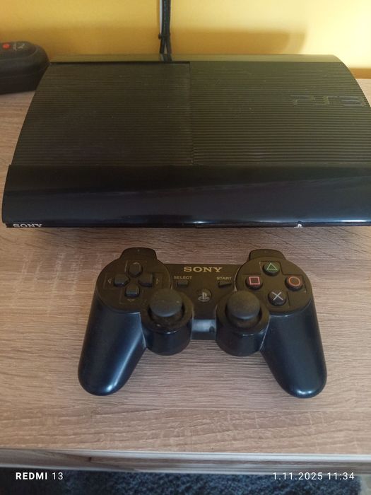 Sprzedam konsole PS3 plus 12 gier pad kontroler ruchu kable