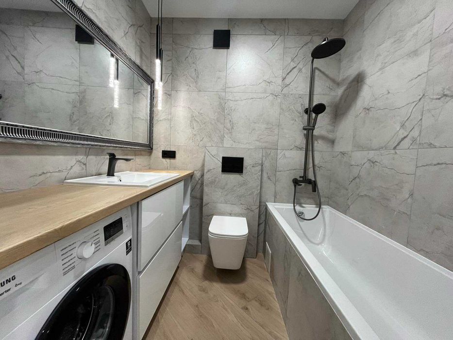 Неймовірно стильна квартира з гарним виглядом на парк мінімальне оформ