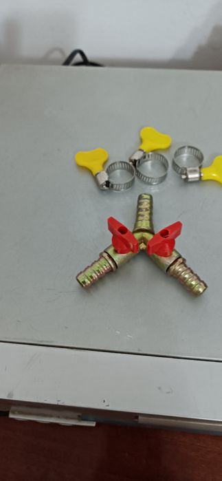 Cruzeta com torneiras de segurança de gás