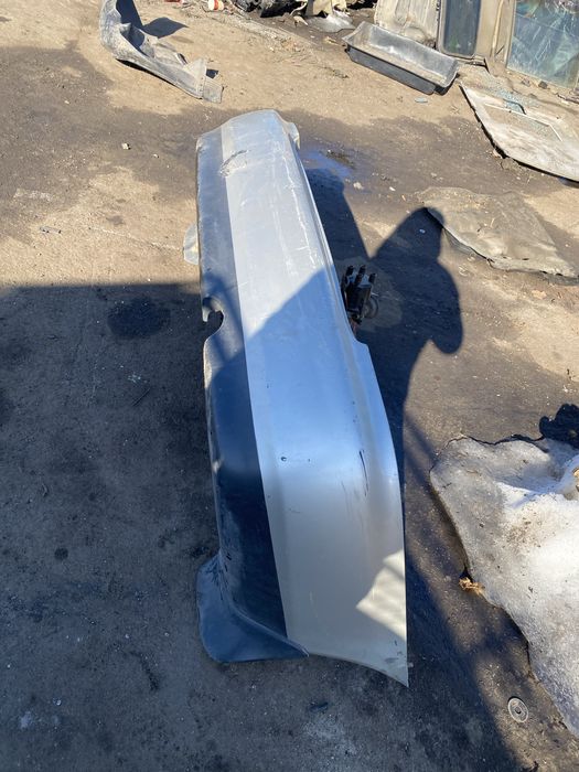 Бампер задний mazda 323ba седан