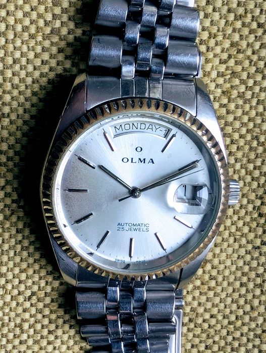 Швейцарские часы  Olma
