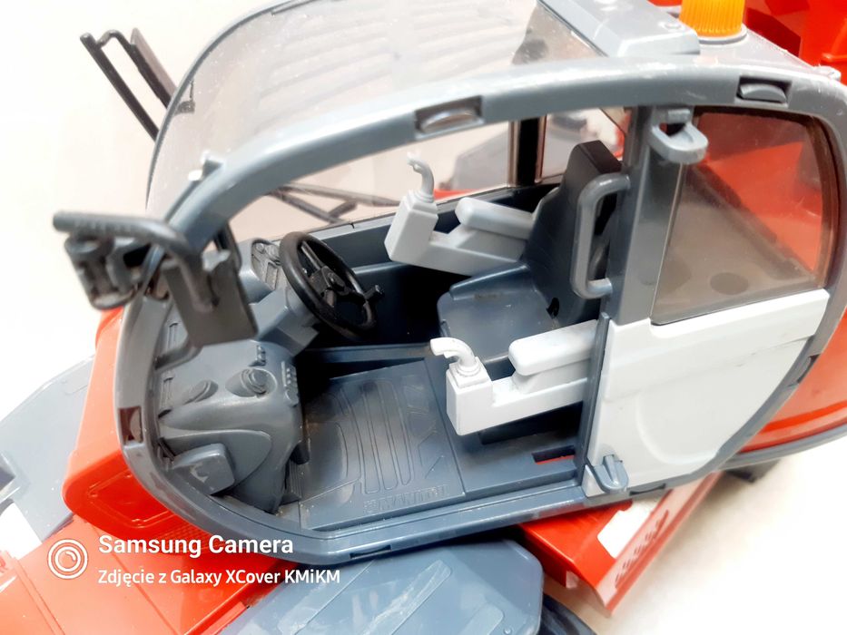 zabawka dźwig ładowarka model Bruder Manitou MRT2150 uszkodzona