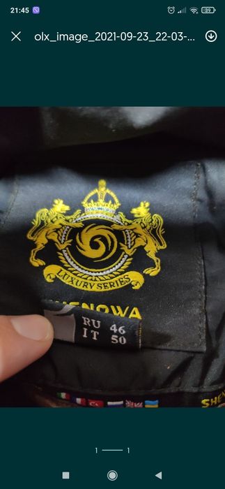 Пуховик куртка пальто жіноче 48-50 розмір