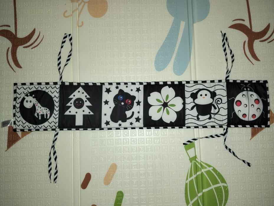 Контрастна розвиваюча книжечка-бортик на дитяче ліжечко