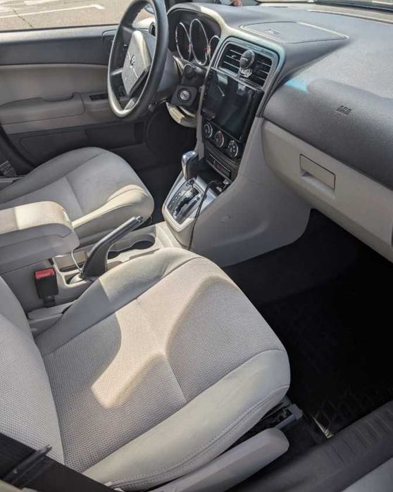 Dodge Caliber 2011 VIN 1B3CB3HA9BD205500 фото оголошення 14 з 16